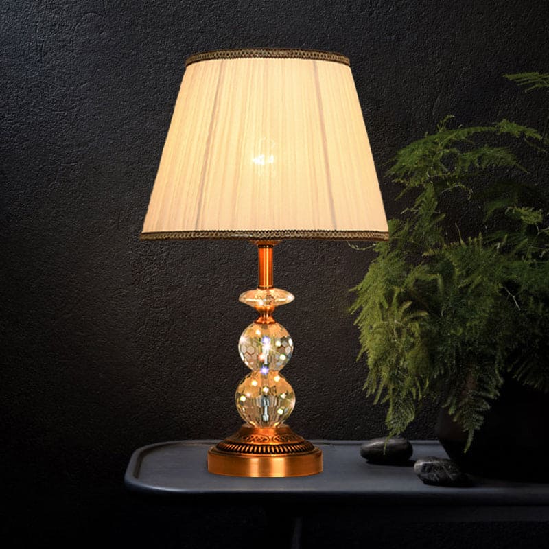 Table lamp with tapered shape and faceted crystal balls | CrystalGlow